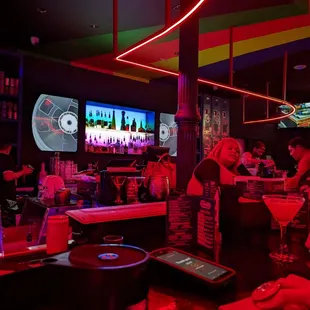 people sitting at a bar