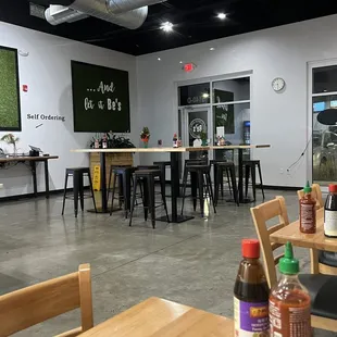 a restaurant with tables and chairs