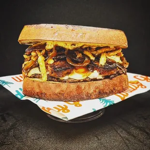 a sandwich with meat and cheese