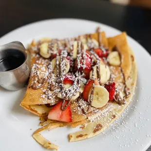 Strawberry banana Nutella crepes. So thin, crispy and light.