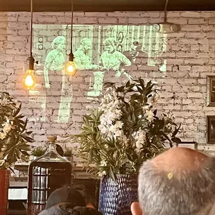 I Love Lucy shows on the wall.