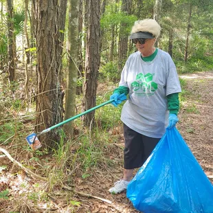The alumni association at Marshall University volunteered for cleanup at Beach &amp; Peach Park.