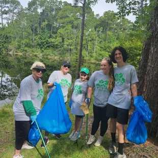 The alumni association at Marshall University volunteered for cleanup at Beach &amp; Peach Park.
