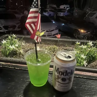 a drink and an american flag