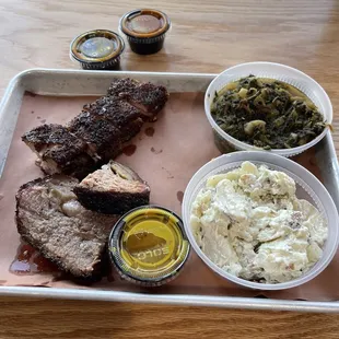 Brisket and pork belly  Bake potato salad and collard greens