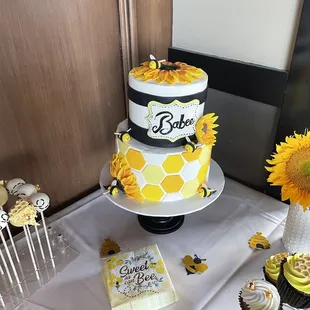 a cake and cupcakes