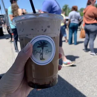 Saturday Society coffee drink with chocolate sauce and caramel foam