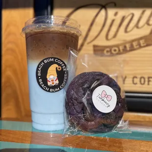 a cup of coffee and a doughnut