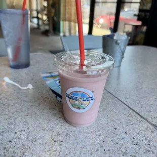 Strawberry, banana and coconut smoothie. We didn't like it, I think it would taste really good if made with real fruits.