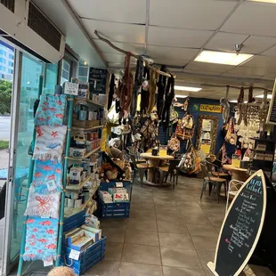 a view of a store with a dog in the foreground