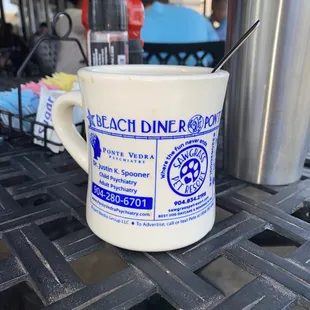 a cup of coffee on a table