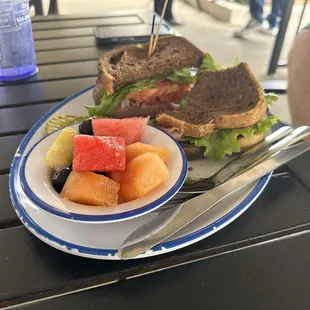 Roast beef sandwich on marble rye with a side of Fresh Fruit
