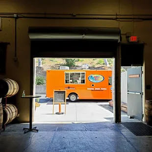 a food truck parked in a garage
