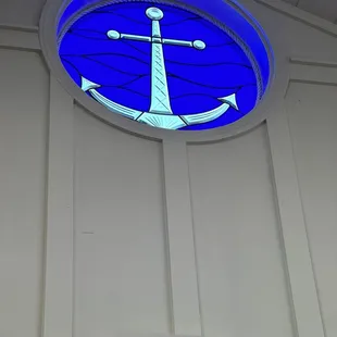 Window above restaurant entrance.