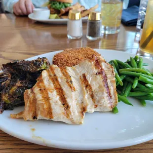 Chicken with sweet potatoe cake, green beans amd Brussel sprouts.