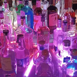 a variety of liquor bottles