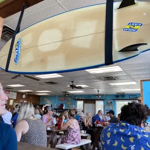 a surfboard hanging from the ceiling