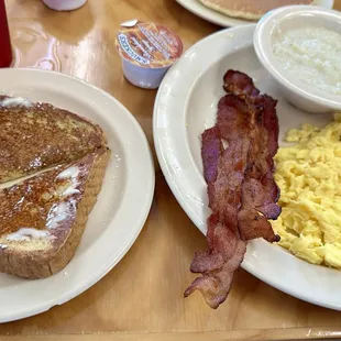 Sampler platter - 2 eggs, two strips of bacon, grits, and one slice of French toast