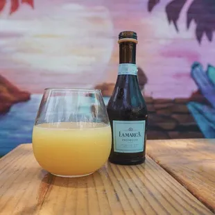 Mimosas with your own mini bottle of Lamarca.