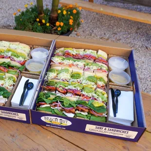 two sandwiches in a box