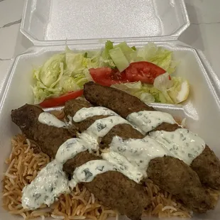 K1-Shami Kabob Skewers of ground meat seasoned with spices.