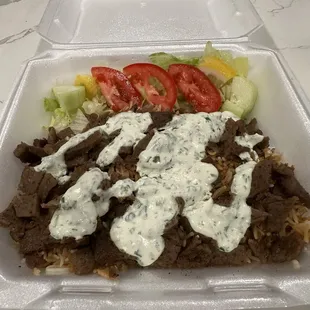 S3- Lamb over rice with house white sauce.