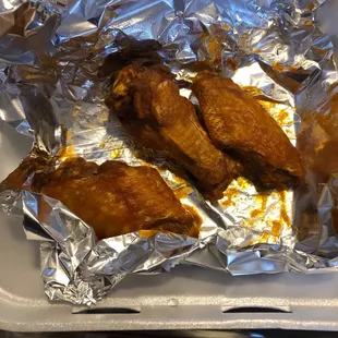 a tray of chicken wings