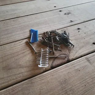 rusty nail and screws found on the open deck and in the sand around the property