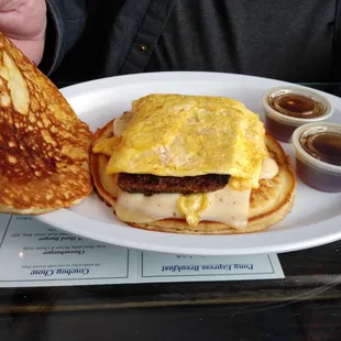 Salt Water Cowboy. Choice of meats, egg and cheese inside two pancakes.