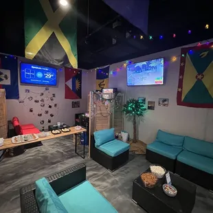 lounge area with tvs