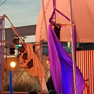 a man on a hammock in the air