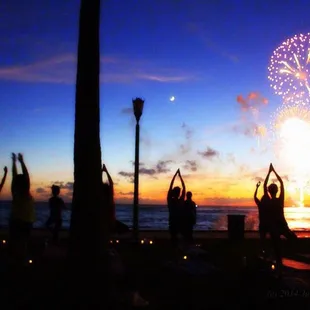 fireworks yoga flow - beach yoga in waikiki on fireworks!