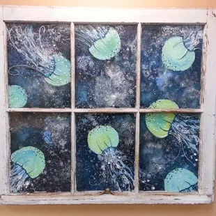 Becky Rogers painted windows- local outer banks artist at Beach Treasures Duck NC