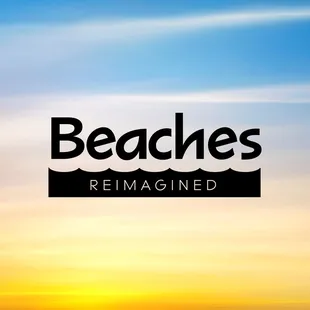 a beach with a sunset in the background