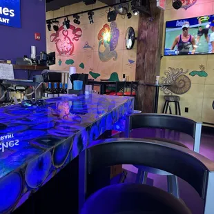 a bar with blue lights