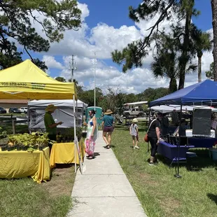people walking down the sidewalk