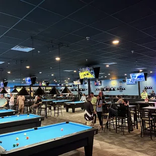 a pool table in a sports bar