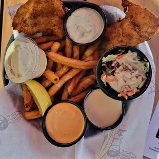 2 tiny pieces of fish, kinda thin, not much in them. I appreciated the sauces. Fries were absolutely cold but tasted ok despite that.