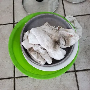 Mold being cleaned from dishes