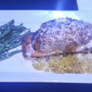 Salmon with stuffed crab and green beans over rice