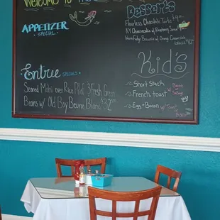 a table and chairs in a restaurant