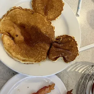 Mickey Mouse pancakes and side of bacon