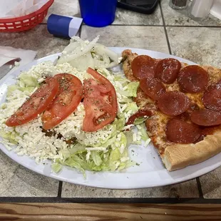 Salad/pizza lunch combo.