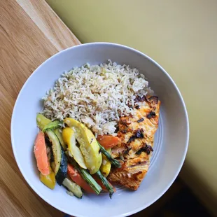 grilled salmon - filleted in-house and marinated overnight served with local seasonal vegetables, brown basmati rice or mashed potatoes