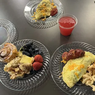 three plates of food on a table