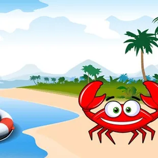 a crab on the beach with a cell phone