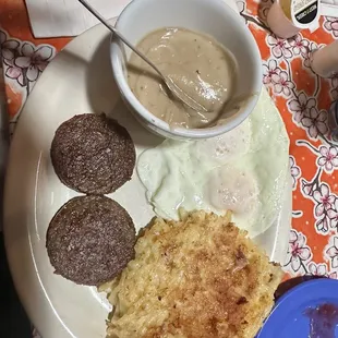 My 2 egg breakfast with sausage patties, sawmill gravy, and hashbrown casserole. Delicious!