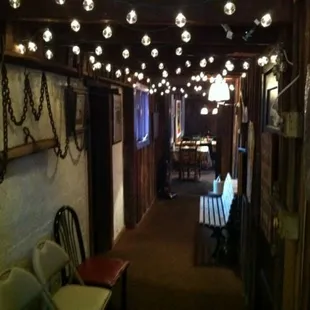 Hallway to One of three dining rooms (well, two dining rooms with one split by a fireplace).