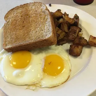 2 eggs sunny side up with hash browns and toast $3.95