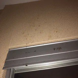 the weird stains above the mirror door
